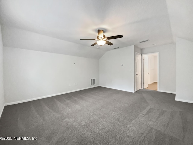1090 Lauriston Dr, Saint Johns, FL 32259 - additional living space featuring ceiling fan, dark carpet, and vaulted ceiling