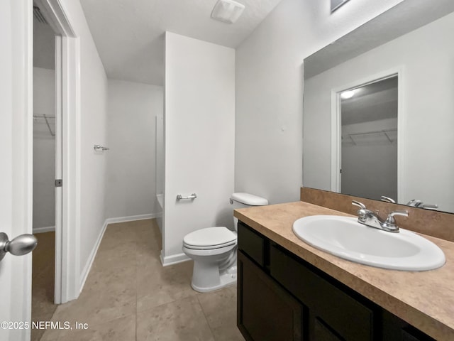 1090 Lauriston Dr, Saint Johns, FL 32259 - bathroom featuring vanity, a spacious closet, a tub to relax in, and tile patterned floors