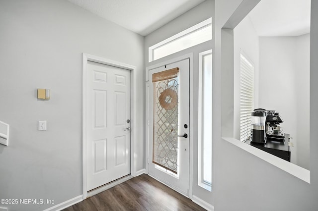14410 Pelican Bay Ct, Jacksonville, FL 32224 - entrance foyer featuring dark wood finished floors and baseboards