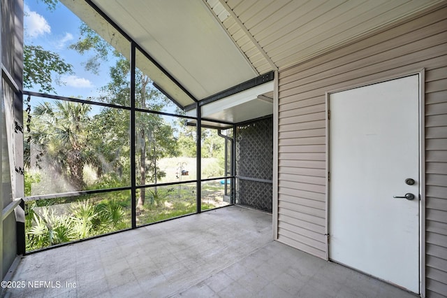 14410 Pelican Bay Ct, Jacksonville, FL 32224 - unfurnished sunroom with vaulted ceiling