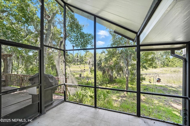 14410 Pelican Bay Ct, Jacksonville, FL 32224 - unfurnished sunroom featuring view of wooded area