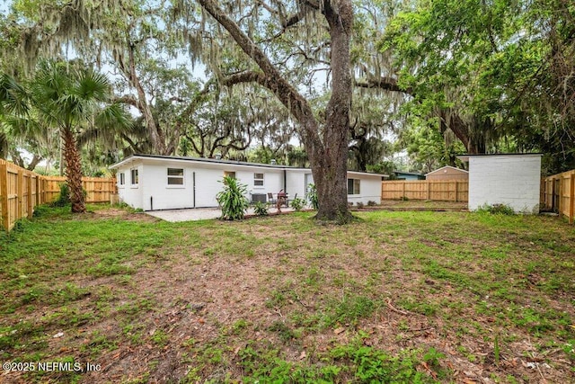 2571 Montreal St, Jacksonville, FL 32233 - rear view of house featuring a patio and a fenced backyard