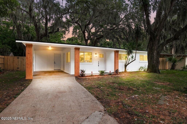 2571 Montreal St, Jacksonville, FL 32233 - view of front of property with concrete driveway and a carport