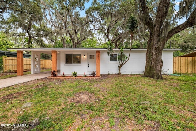 2571 Montreal St, Jacksonville, FL 32233 - view of front of property featuring driveway and an attached carport
