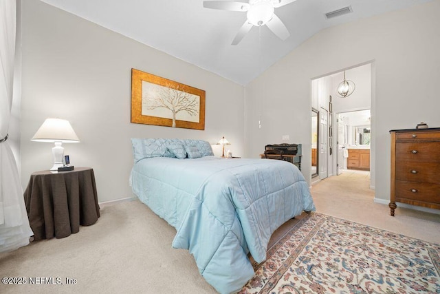 814 Copperhead Cir, Saint Augustine, FL 32092 - bedroom featuring light colored carpet, vaulted ceiling, connected bathroom, and ceiling fan