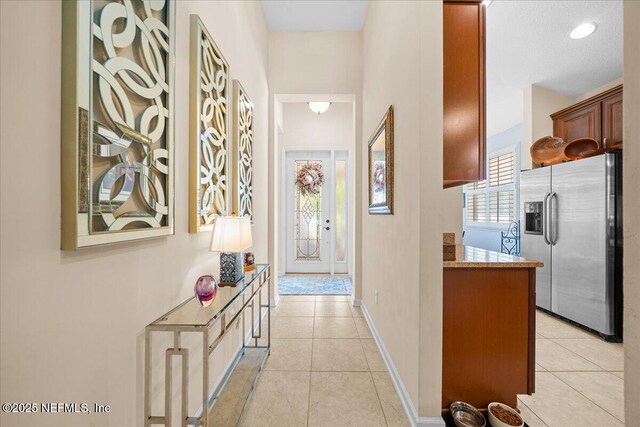 814 Copperhead Cir, Saint Augustine, FL 32092 - corridor featuring light tile patterned floors