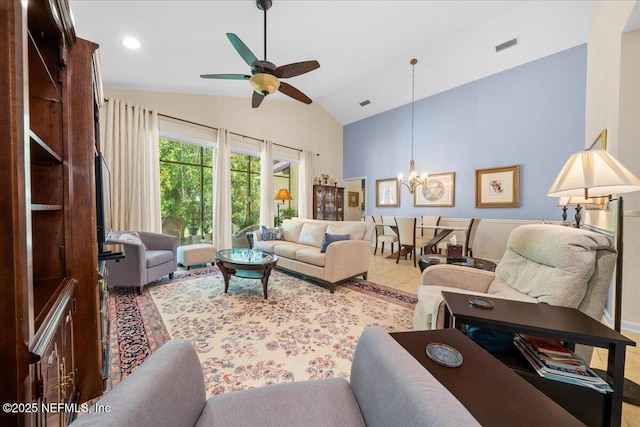 814 Copperhead Cir, Saint Augustine, FL 32092 - living area with a ceiling fan, a chandelier, and high vaulted ceiling
