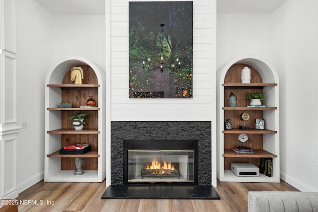 24237 Marsh Landing Pkwy, Ponte Vedra Beach, FL 32082 - detailed view of wood finished floors and a glass covered fireplace