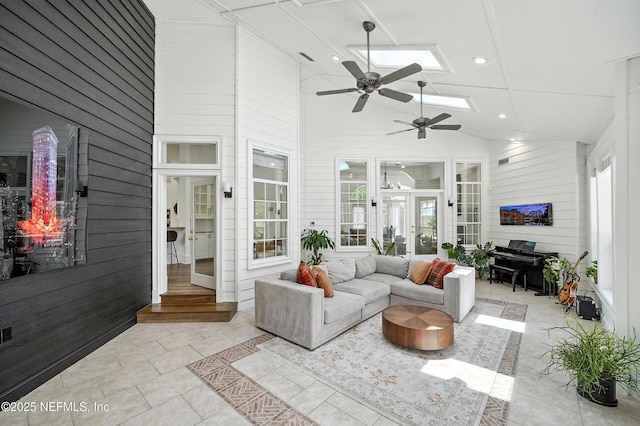 24237 Marsh Landing Pkwy, Ponte Vedra Beach, FL 32082 - sunroom with a ceiling fan, an outdoor hangout area, french doors, plenty of natural light, and vaulted ceiling