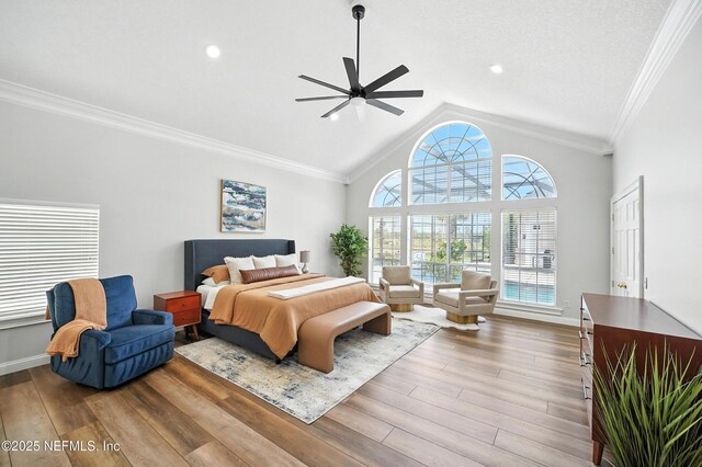 24237 Marsh Landing Pkwy, Ponte Vedra Beach, FL 32082 - bedroom with wood finished floors, ornamental molding, high vaulted ceiling, a ceiling fan, and recessed lighting