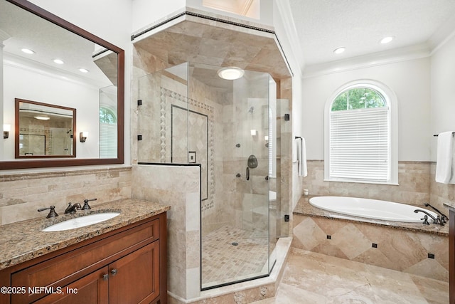 24237 Marsh Landing Pkwy, Ponte Vedra Beach, FL 32082 - bathroom featuring a bath, crown molding, vanity, a shower stall, and tile walls