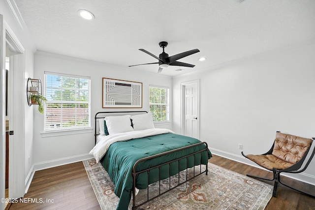 24237 Marsh Landing Pkwy, Ponte Vedra Beach, FL 32082 - bedroom featuring wood finished floors, recessed lighting, a ceiling fan, and a textured ceiling
