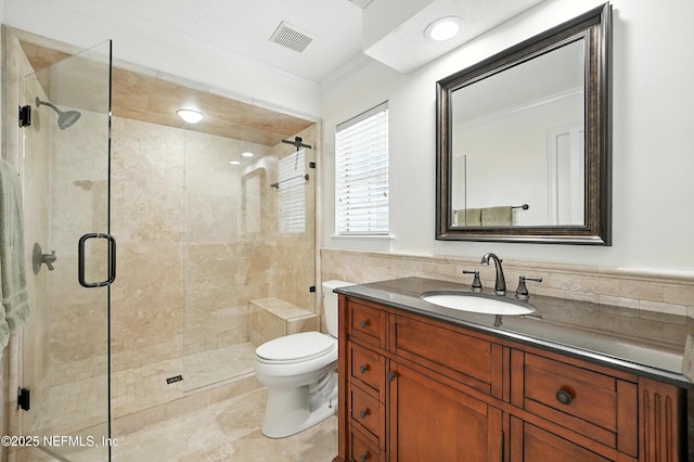 24237 Marsh Landing Pkwy, Ponte Vedra Beach, FL 32082 - bathroom with ornamental molding, a shower stall, vanity, and tile walls