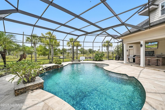 24237 Marsh Landing Pkwy, Ponte Vedra Beach, FL 32082 - swimming pool with an outdoor kitchen, a patio area, and glass enclosure