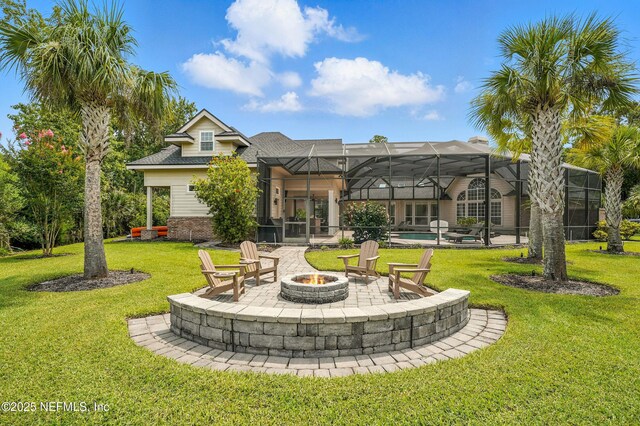 24237 Marsh Landing Pkwy, Ponte Vedra Beach, FL 32082 - rear view of house featuring a fire pit, an outdoor pool, a patio, and a yard