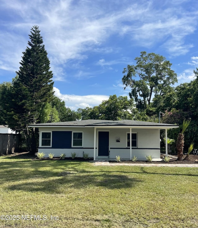 5364 River Forest Dr, Jacksonville, FL 32211 - ranch-style house with a front lawn