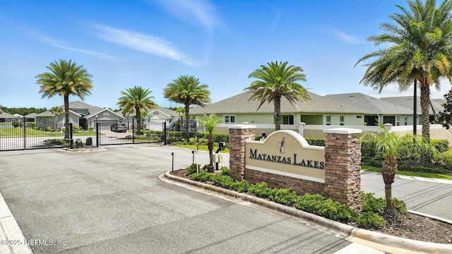 29 Lagoon Way, Palm Coast, FL 32137 - community / neighborhood sign featuring a residential view and a gate