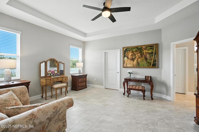 29 Lagoon Way, Palm Coast, FL 32137 - sitting room featuring a ceiling fan and a tray ceiling