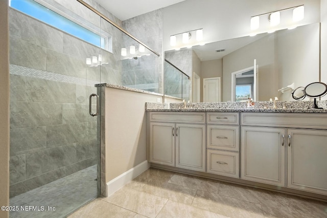 29 Lagoon Way, Palm Coast, FL 32137 - bathroom with a shower stall and double vanity