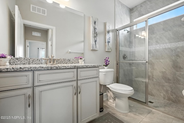 29 Lagoon Way, Palm Coast, FL 32137 - bathroom featuring vanity and a shower stall
