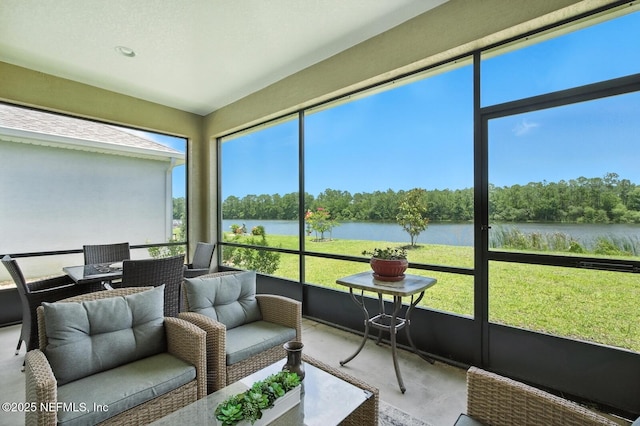 29 Lagoon Way, Palm Coast, FL 32137 - sunroom / solarium featuring a water view