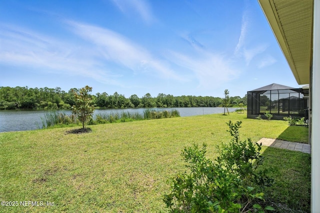 29 Lagoon Way, Palm Coast, FL 32137 - view of green lawn with a water view and a lanai