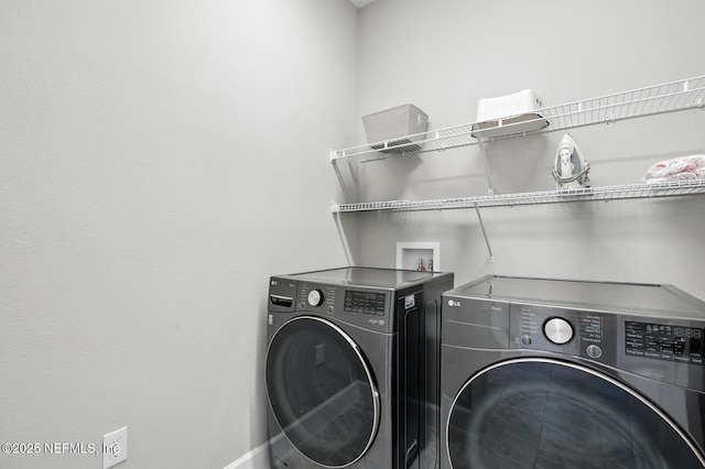 29 Lagoon Way, Palm Coast, FL 32137 - laundry area with washer and clothes dryer