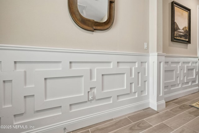 3146 Villa Vera Ct, Jacksonville, FL 32246 - detailed view of wainscoting, a decorative wall, and wood finish floors