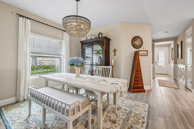 3146 Villa Vera Ct, Jacksonville, FL 32246 - dining area with a chandelier and light wood finished floors
