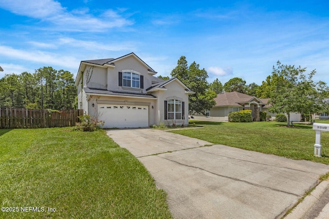 3350 Silverado Cir, Green Cove Springs, FL 32043 - traditional-style home with a garage, concrete driveway, and stucco siding