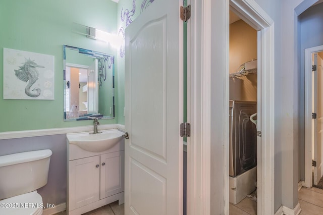 3350 Silverado Cir, Green Cove Springs, FL 32043 - bathroom with vanity, tile patterned flooring, washer / clothes dryer, and a closet
