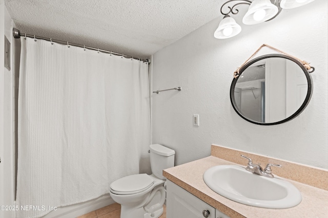 355 Monument Rd Unit 15D1, Jacksonville, FL 32225 - bathroom featuring a textured ceiling, vanity, tile patterned flooring, and shower / bath combination with curtain