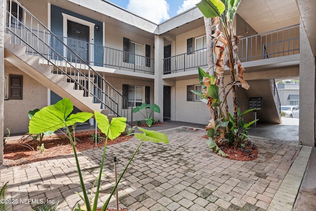 355 Monument Rd Unit 15D1, Jacksonville, FL 32225 - view of property featuring stairs