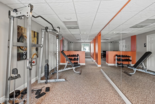 355 Monument Rd Unit 15D1, Jacksonville, FL 32225 - workout area with baseboards and a drop ceiling