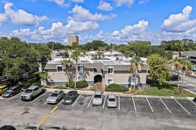 355 Monument Rd Unit 15D1, Jacksonville, FL 32225 - view of property featuring uncovered parking