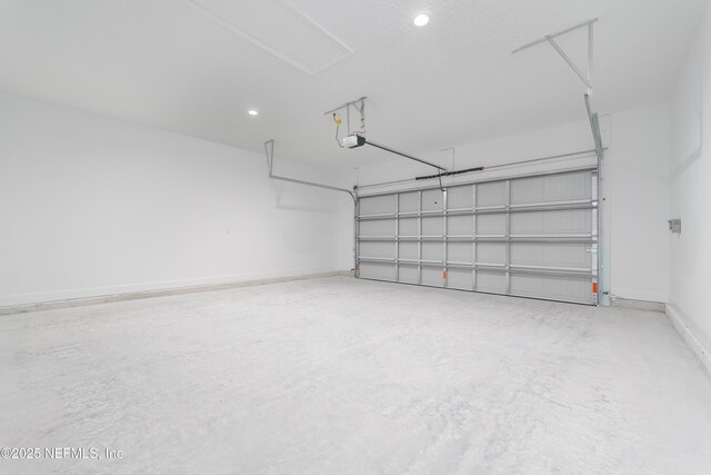 1861 Openwoods Rd, Middleburg, FL 32068 - garage featuring a garage door opener and recessed lighting