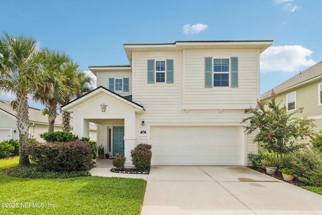 148 Ancient Island Dr, Saint Augustine, FL 32080 - traditional-style home with driveway, a garage, and a front yard