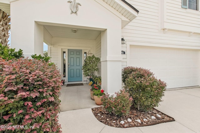 148 Ancient Island Dr, Saint Augustine, FL 32080 - entrance to property featuring a garage and concrete driveway