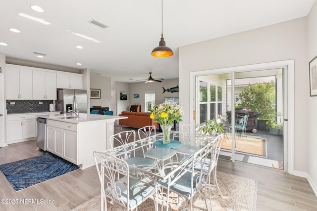 148 Ancient Island Dr, Saint Augustine, FL 32080 - dining space featuring light wood-type flooring, ceiling fan, and recessed lighting