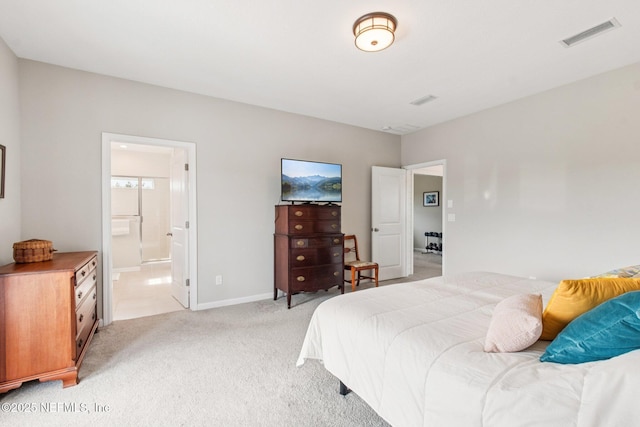 148 Ancient Island Dr, Saint Augustine, FL 32080 - bedroom with light carpet and ensuite bathroom