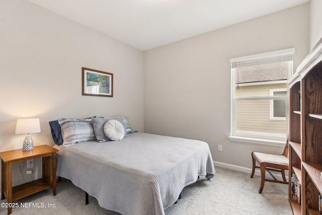 148 Ancient Island Dr, Saint Augustine, FL 32080 - carpeted bedroom with baseboards