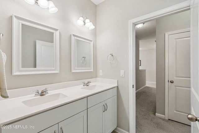 148 Ancient Island Dr, Saint Augustine, FL 32080 - bathroom featuring double vanity and baseboards
