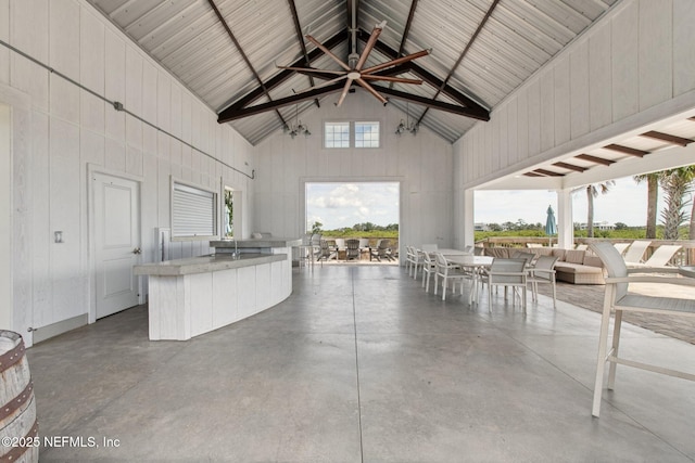 148 Ancient Island Dr, Saint Augustine, FL 32080 - view of patio / terrace featuring exterior kitchen, a ceiling fan, outdoor dining space, and exterior bar