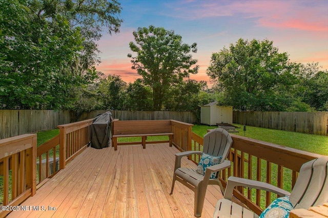 455 Aiken Rd, Jacksonville, FL 32216 - deck with a fenced backyard, a storage shed, and area for grilling