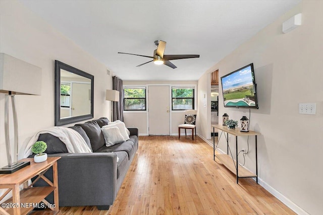 455 Aiken Rd, Jacksonville, FL 32216 - living area featuring a ceiling fan and light wood-style floors
