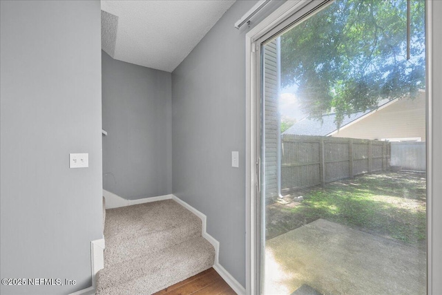 7632 Rain Forest Dr W, Jacksonville, FL 32277 - stairs featuring wood finished floors and carpet floors