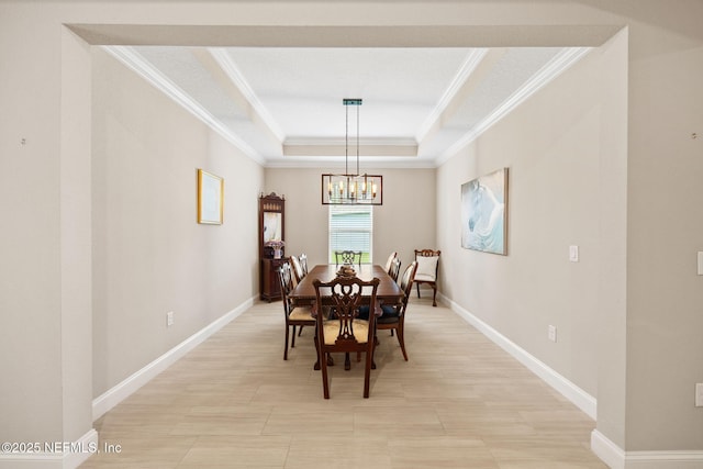 121 Seamount Way, Saint Augustine, FL 32092 - dining space with a chandelier, ornamental molding, and a raised ceiling