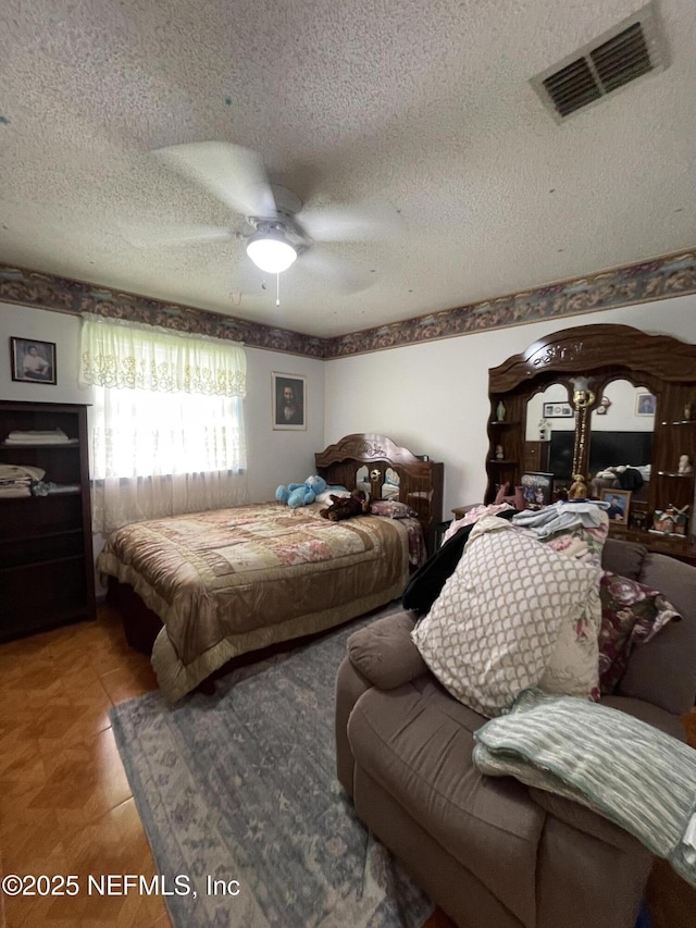 1038 Celebrant Dr, Jacksonville, FL 32225 - bedroom with a textured ceiling and ceiling fan