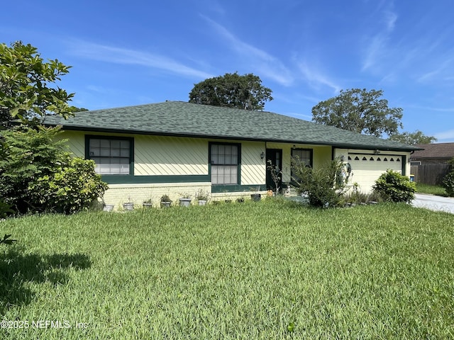 1038 Celebrant Dr, Jacksonville, FL 32225 - ranch-style home featuring an attached garage, a front yard, a shingled roof, and concrete driveway