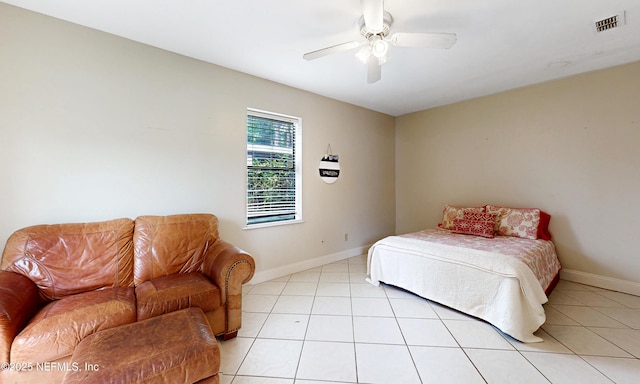 5110 Janice Cir E, Jacksonville, FL 32210 - bedroom featuring light tile patterned floors and a ceiling fan